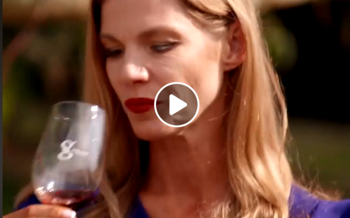 Sharon drinking wine in Instant hotel